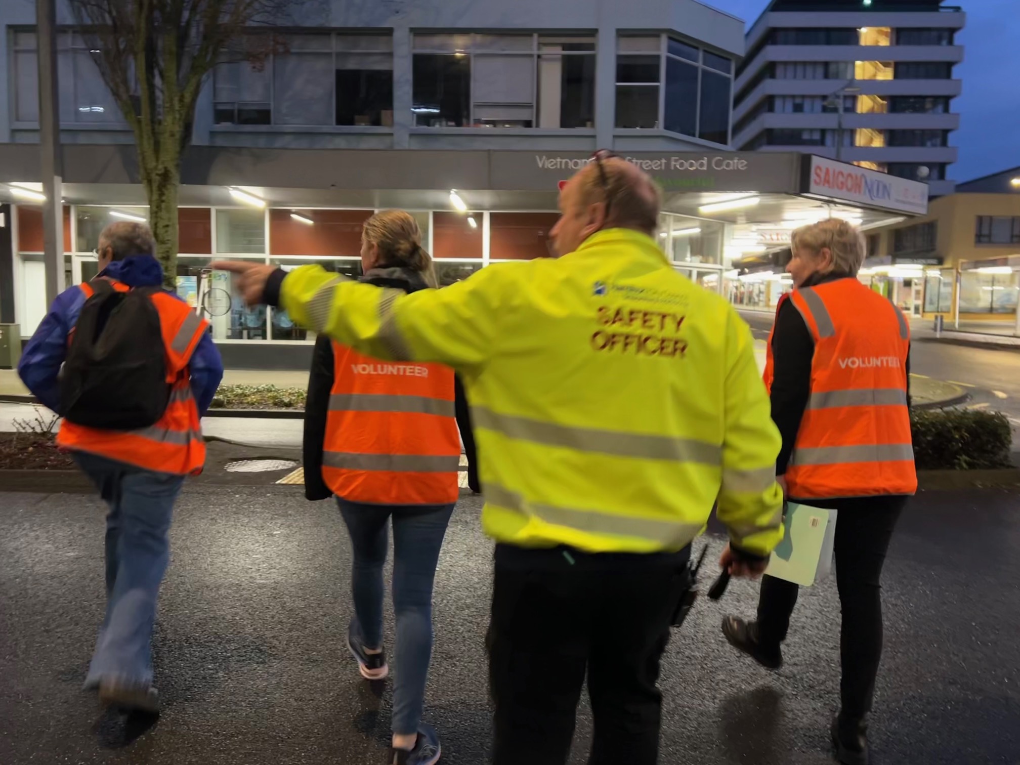 TPP staff and volunteers in hi-vis in central Hamilton in the early hours of the morning looking for people sleeping rough.